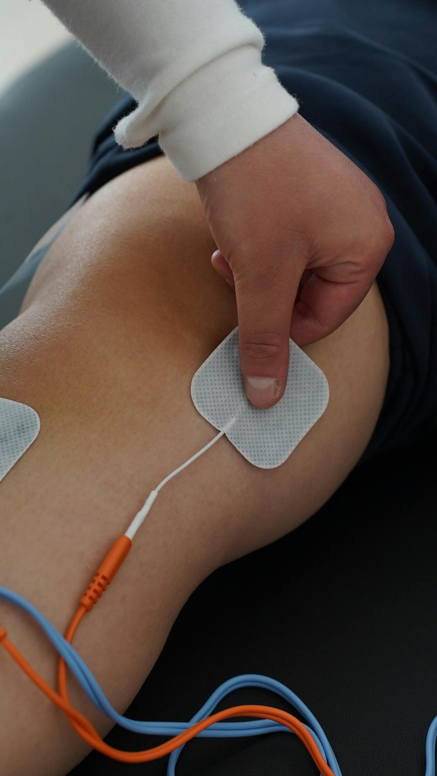TENS & NMES using Enovis Intellect Device - Woods Wellness Centre